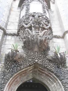 One of the many gargoyles adorning the doorways of the palace.