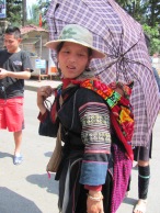 Hilltribe woman with baby in Sapa