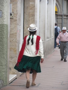 An indigenous woman in Cuenca. She has two braids whereas in Otavalo the women only wore one.