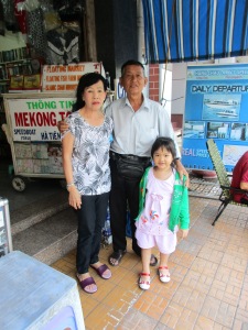 Mr. Long with his wife and granddaughter.